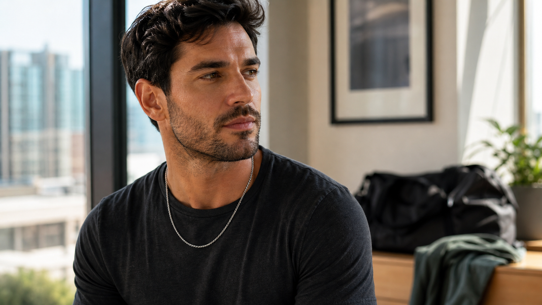 Man wearing a titanium chain in a modern everyday lifestyle setting