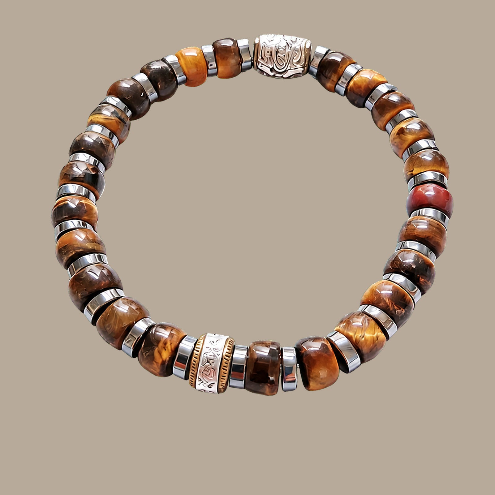 Faceted tiger eye bracelet with silver-tone spacers on a warm taupe background