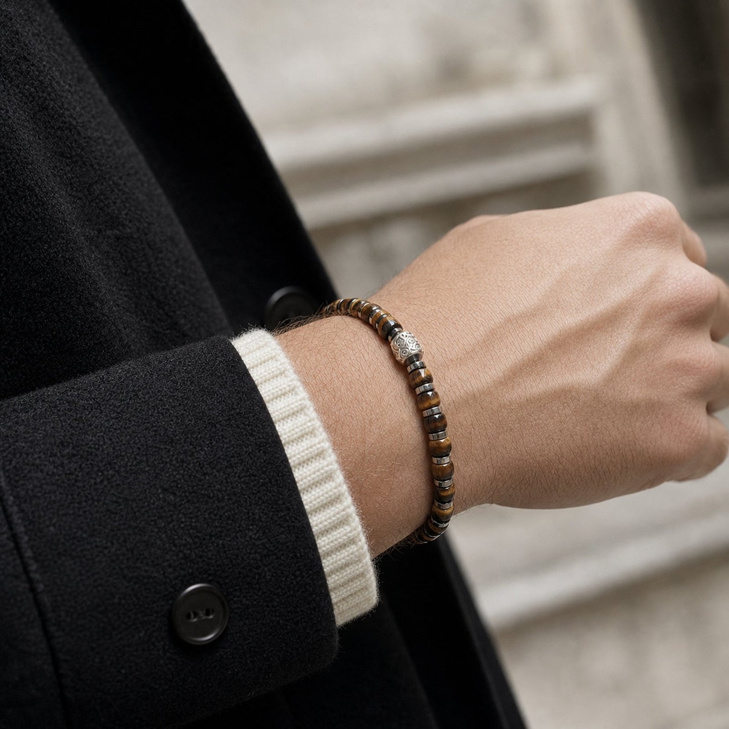 Faceted tiger eye guardian lion bracelet styled with minimalist European menswear