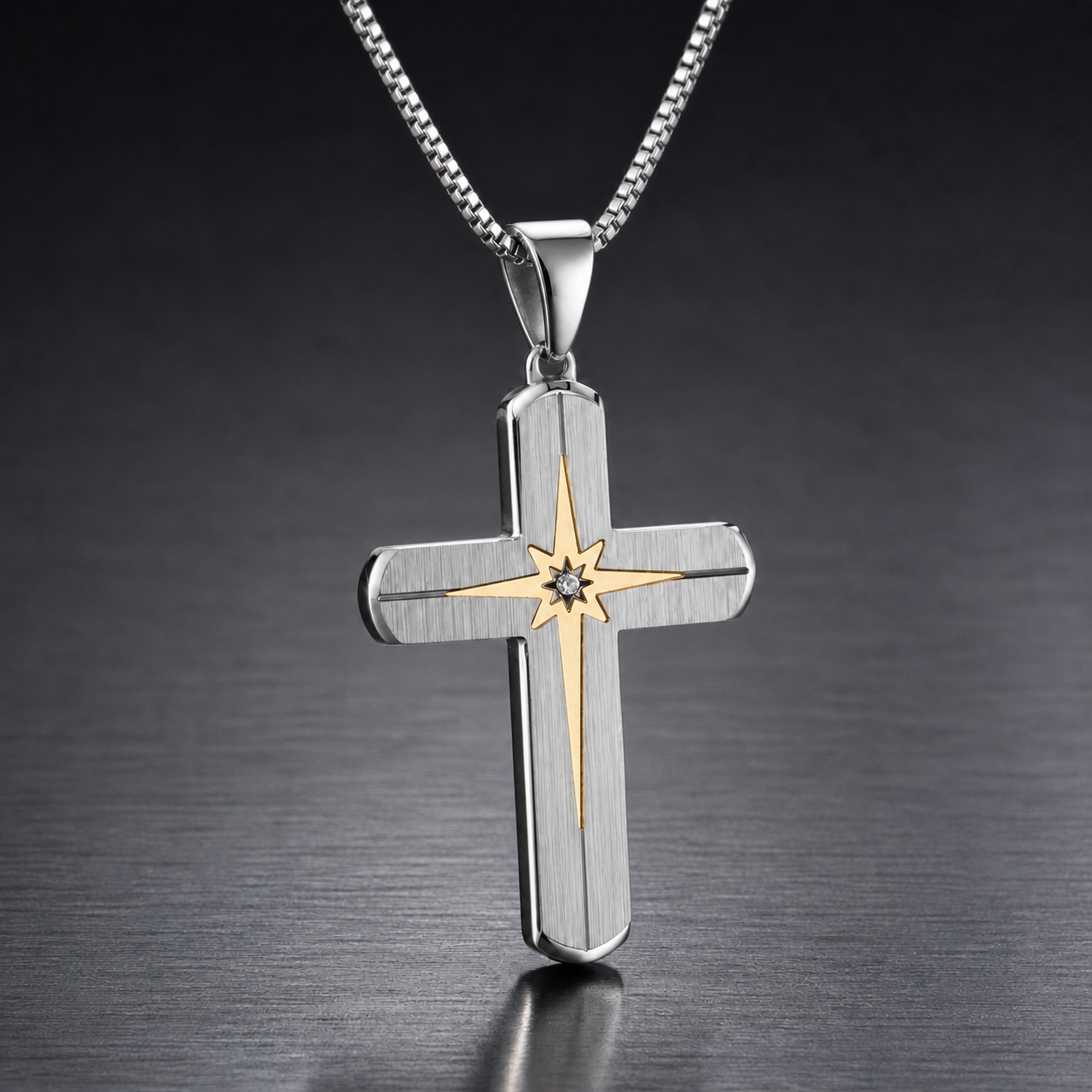 Titanium starburst cross necklace three-quarter angle with round box chain