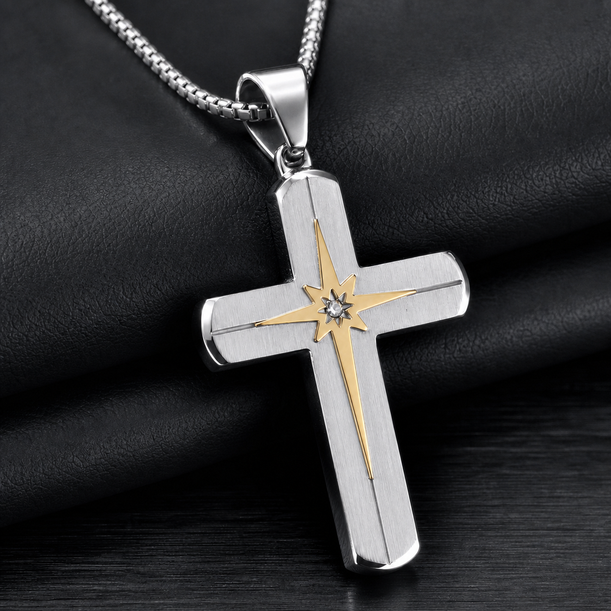 Titanium starburst cross pendant side detail with round box chain
